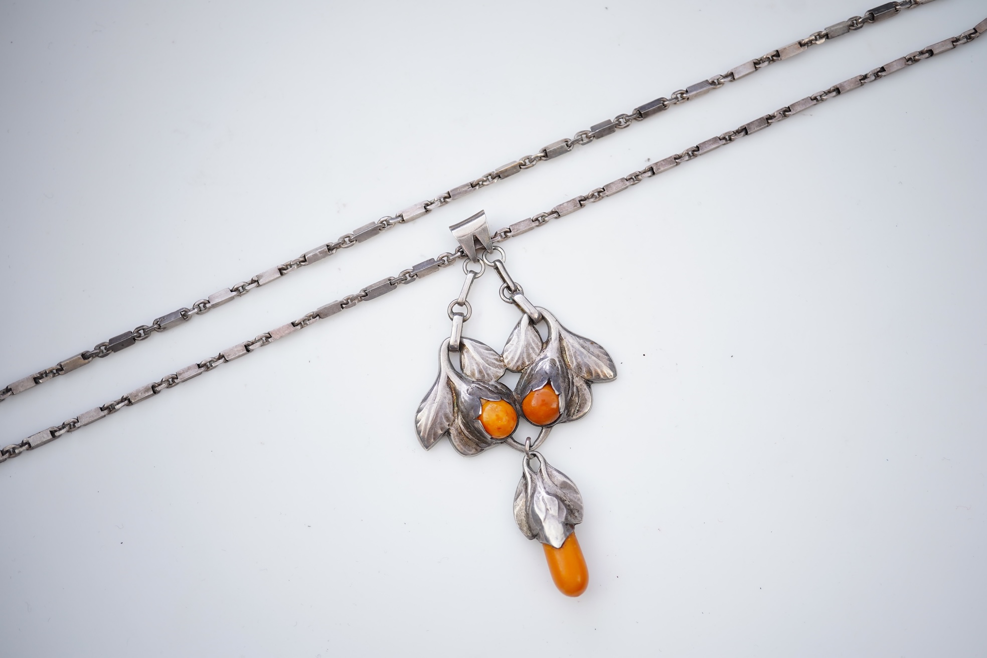 An Arts & Crafts silver and amber necklace, Denmark or Norway, mid 20th century
